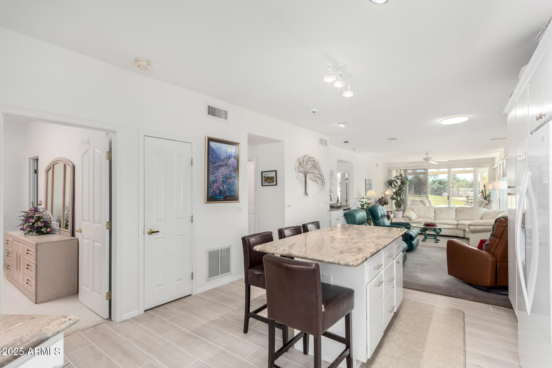 5445 East McKellips Road, Unit 28 Mesa, AZ 85215 - Photo 12 of 39 a large kitchen with a table and chairs