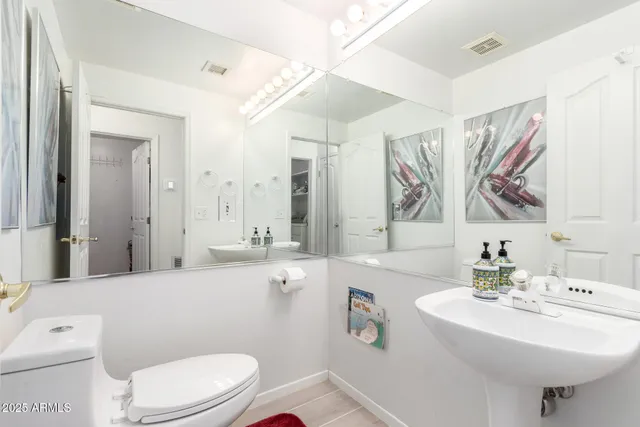 a kitchen with a sink and a stove top oven