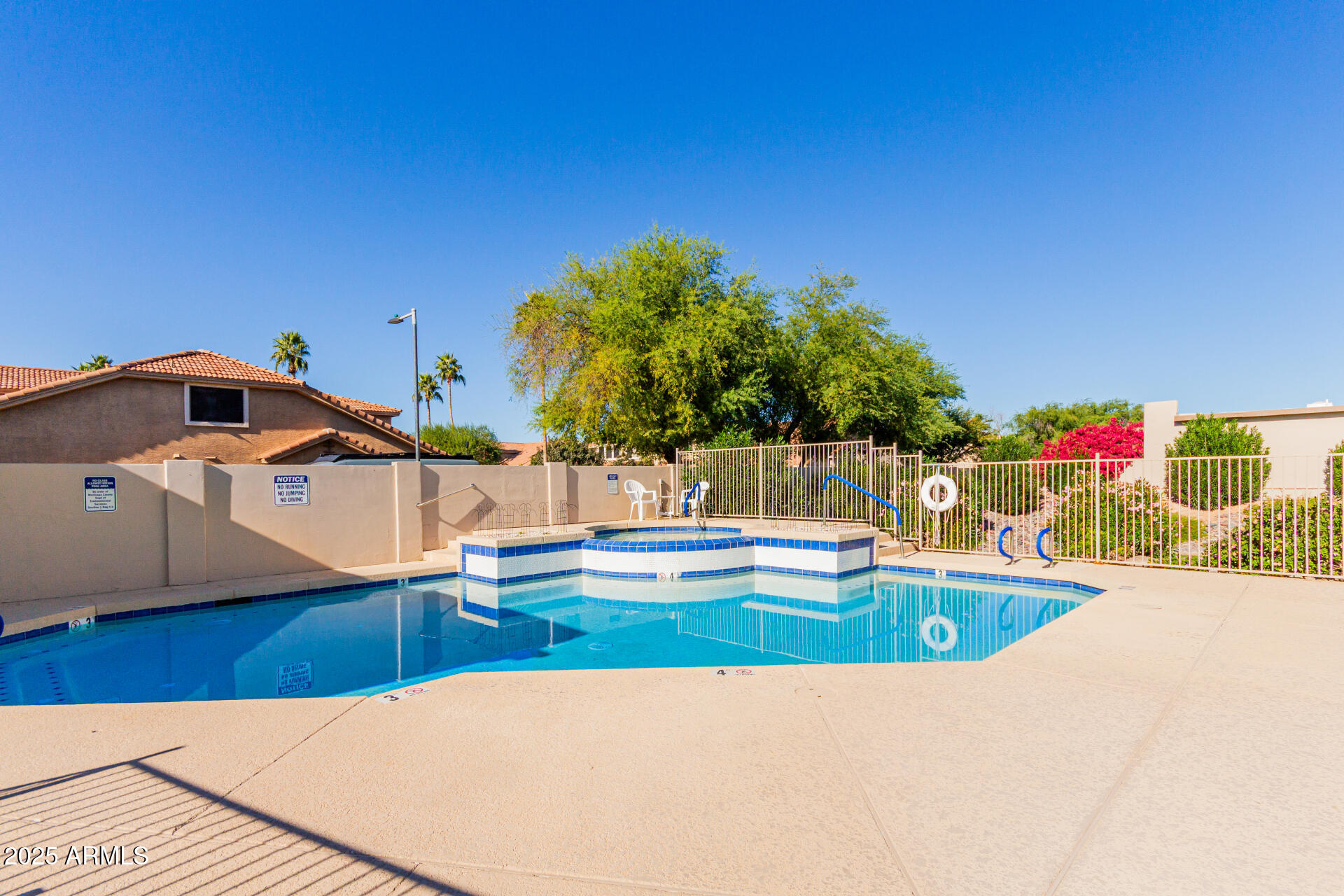 5445 East McKellips Road, Unit 28 Mesa, AZ 85215 - Photo 28 of 39 a view of a swimming pool with an outdoor seating