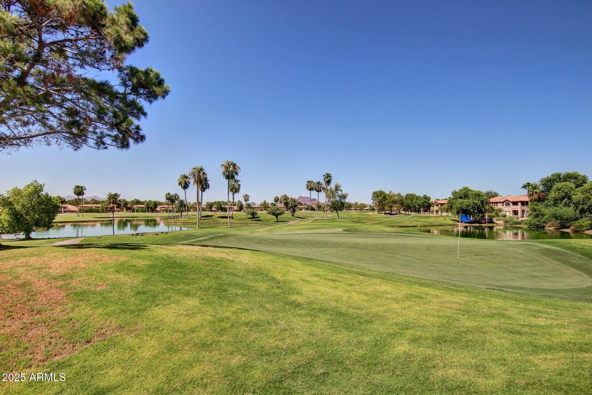 5445 East McKellips Road, Unit 28 Mesa, AZ 85215 - Photo 32 of 39 a view of a water fountain and an outdoor space