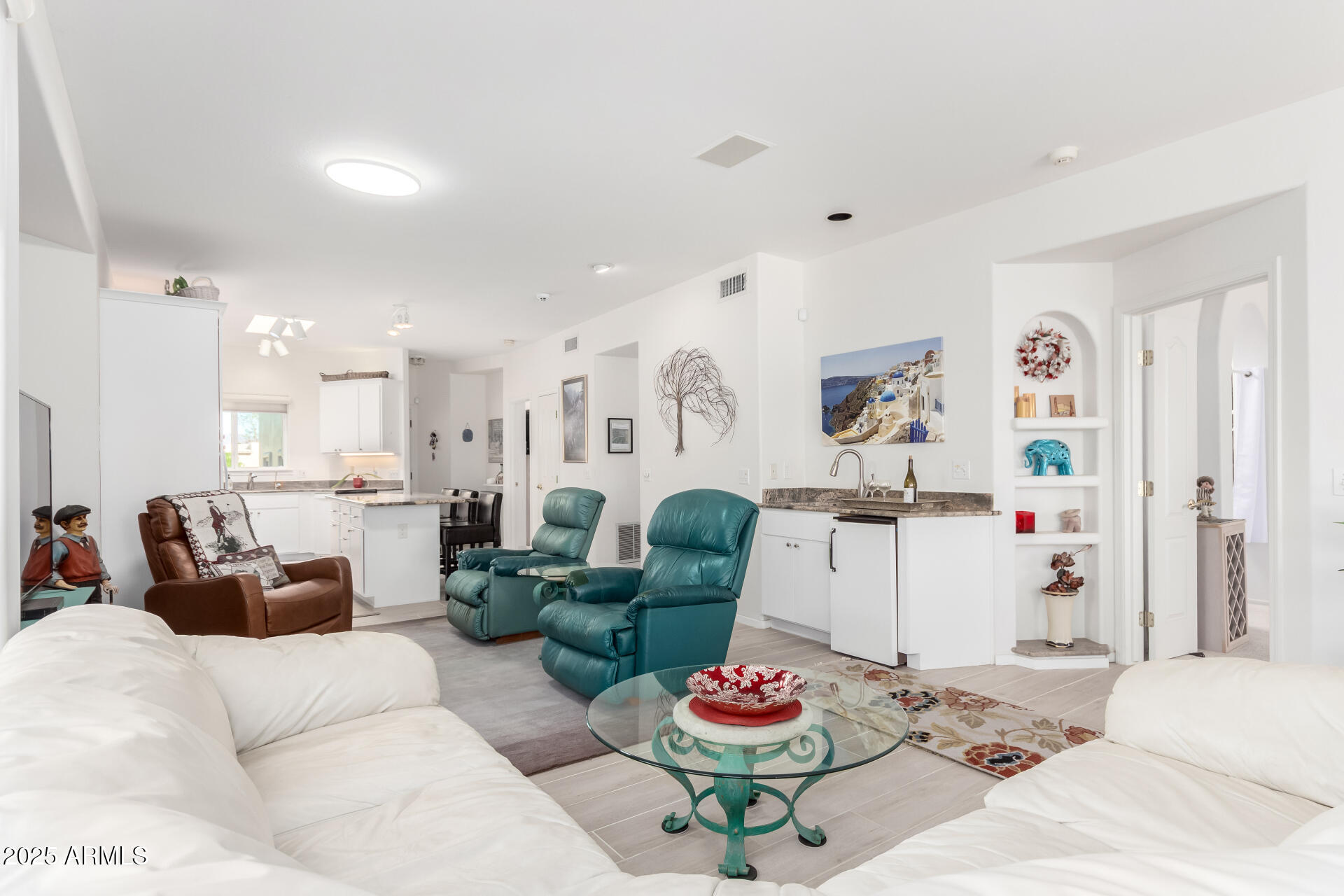 5445 East McKellips Road, Unit 28 Mesa, AZ 85215 - Photo 7 of 39 a living room with furniture and a table