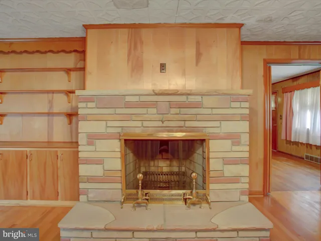 a fireplace with a glass door