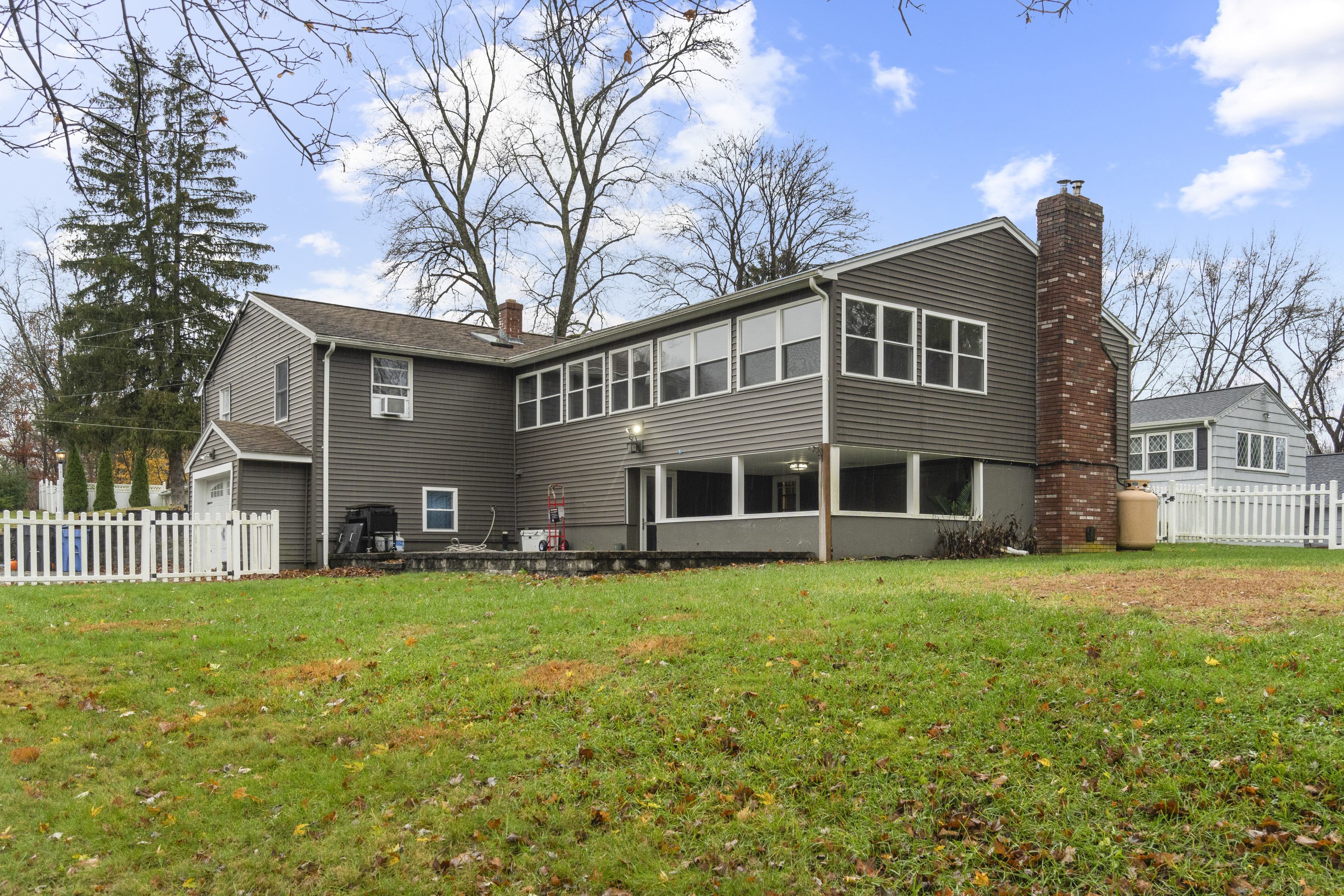 10 Green Acres Lane Thompson, CT 06255 - Photo 2 of 40 a front view of a house with a garden