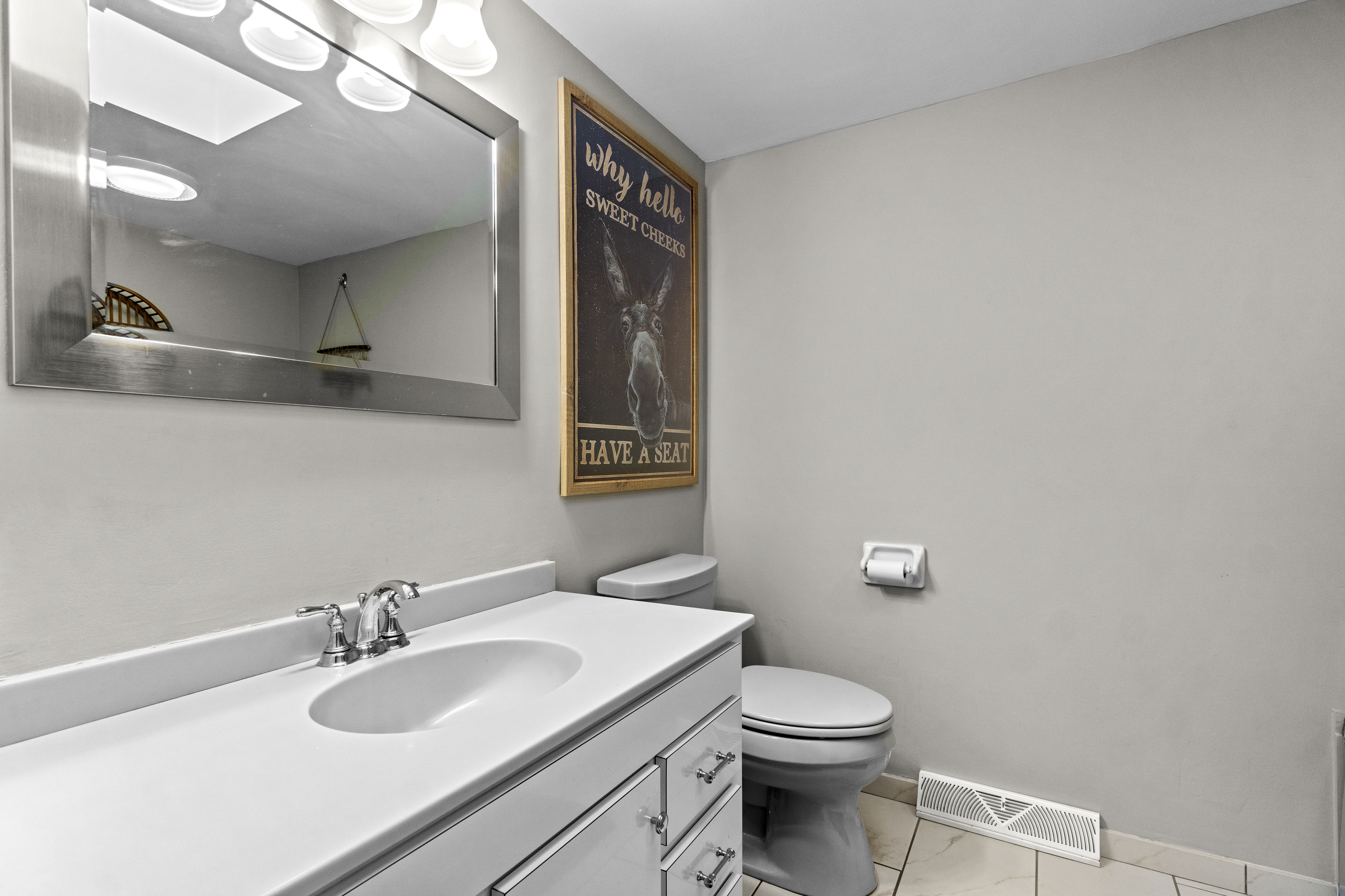 10 Green Acres Lane Thompson, CT 06255 - Photo 23 of 40 a bathroom with a sink vanity mirror and toilet