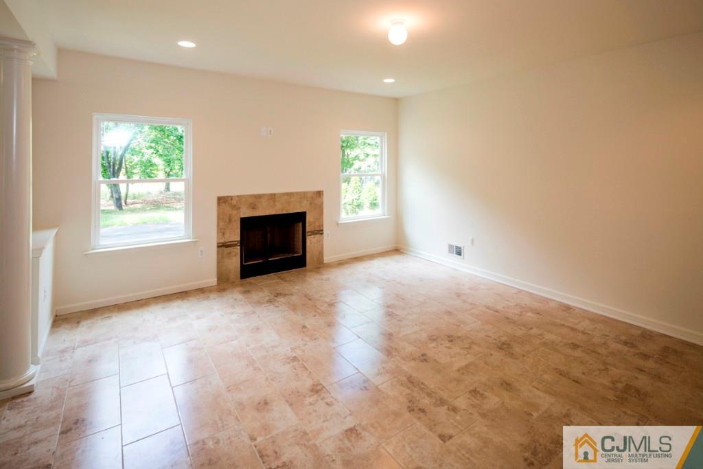 388 Aldrich Road Howell, NJ 07731 - Photo 11 of 24 an empty room with windows