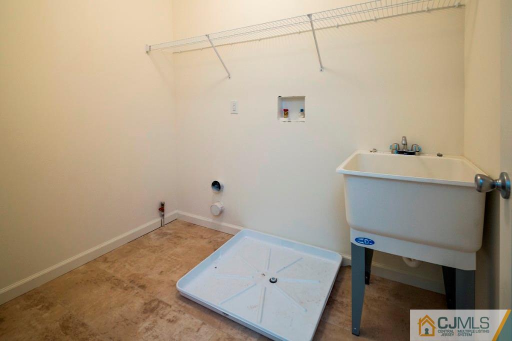388 Aldrich Road Howell, NJ 07731 - Photo 14 of 24 a bathroom with a sink and vanity