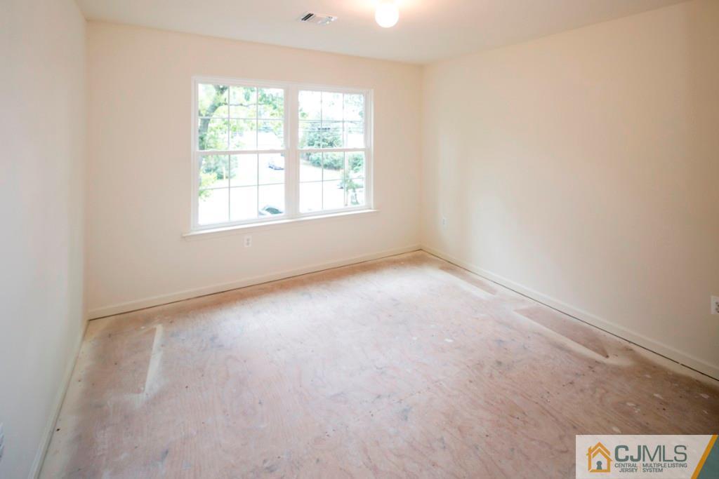 388 Aldrich Road Howell, NJ 07731 - Photo 17 of 24 an empty room with a window