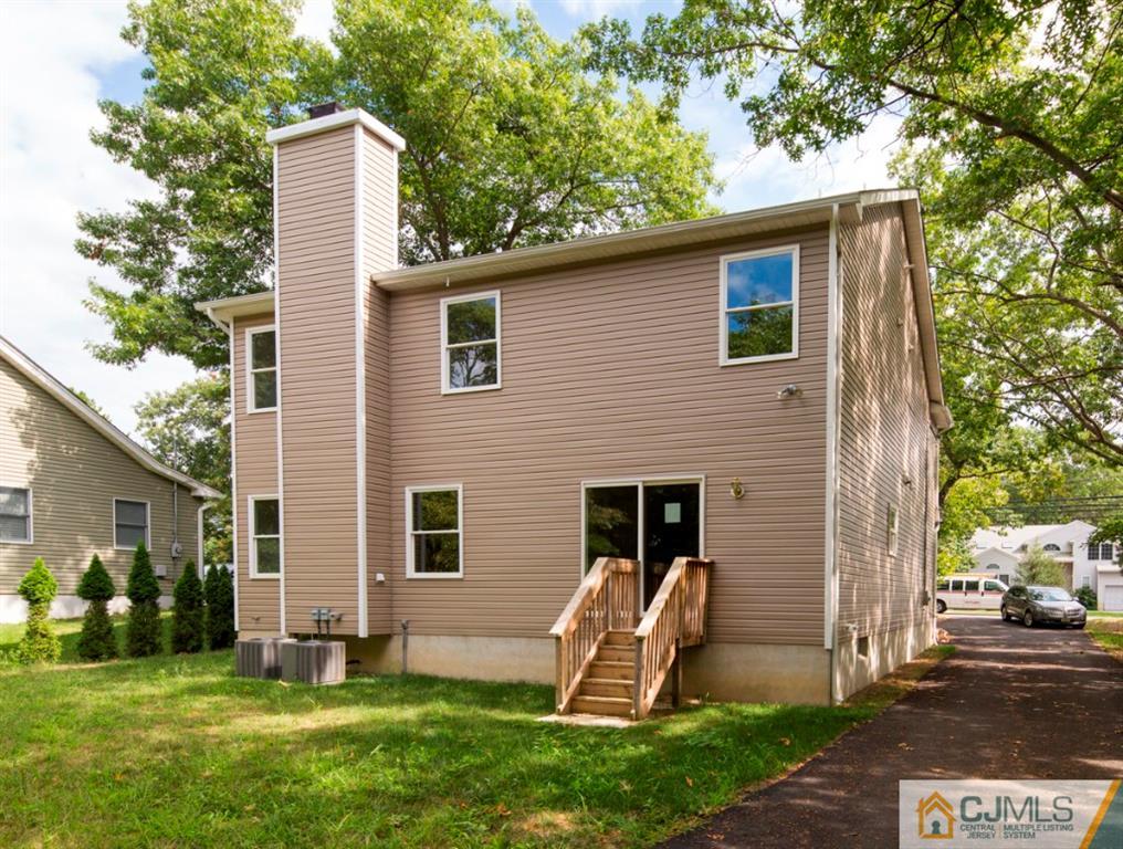 388 Aldrich Road Howell, NJ 07731 - Photo 24 of 24 a front view of house with yard and trees
