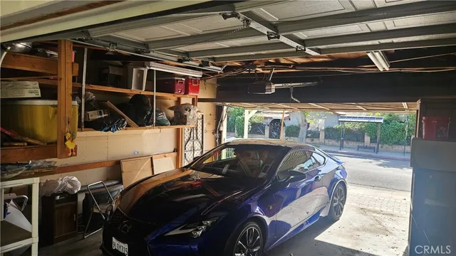 a car parked in front of a house