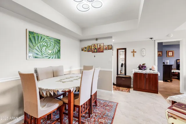 a view of a dining room with furniture