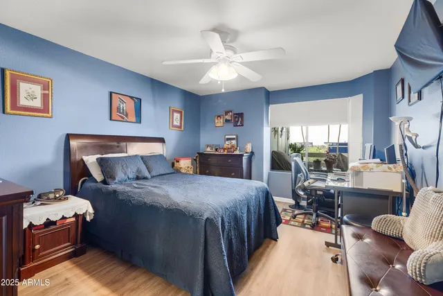 a bedroom with a bed and furniture