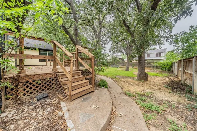 a view of a lake with a garden