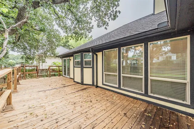 a view of outdoor space with wooden deck