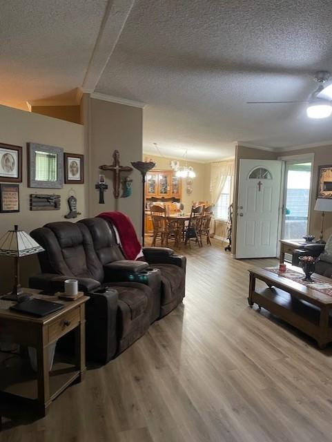 445 County Road 1227 Quitman, TX 75783 - Photo 15 of 29 a living room with furniture a wooden floor and gym equipment