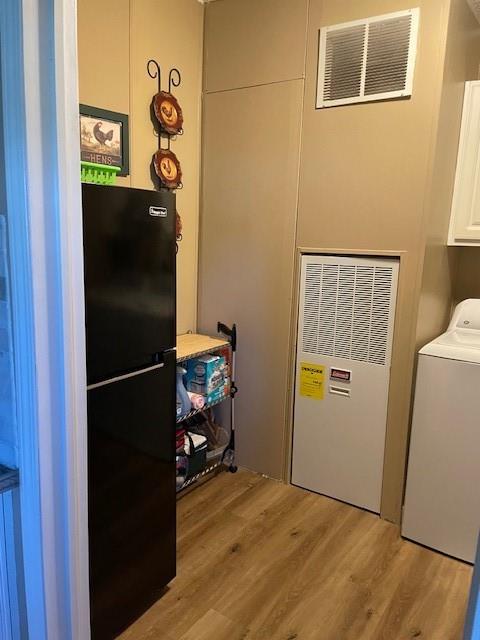 445 County Road 1227 Quitman, TX 75783 - Photo 18 of 29 a view of storage and utility room with a refrigerator