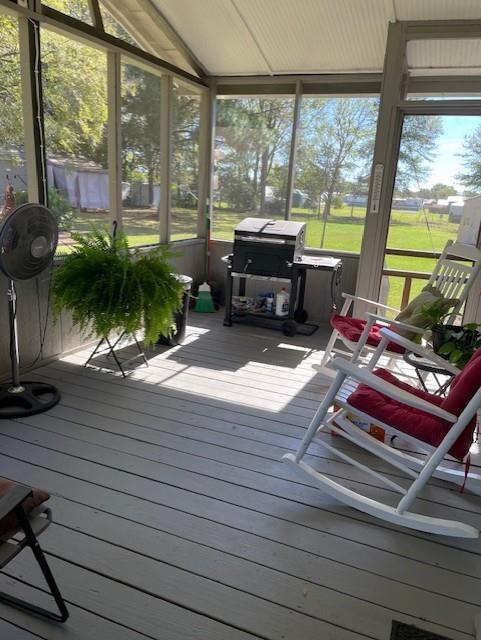 445 County Road 1227 Quitman, TX 75783 - Photo 3 of 29 a living room with furniture large windows and wooden floor