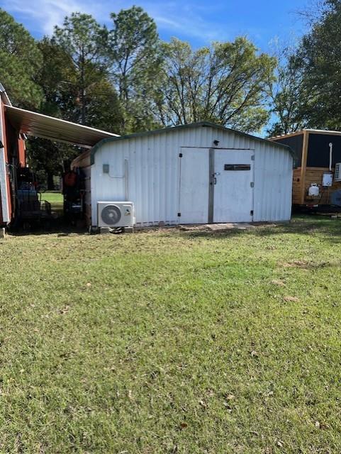 445 County Road 1227 Quitman, TX 75783 - Photo 8 of 29 a view of a house with a backyard