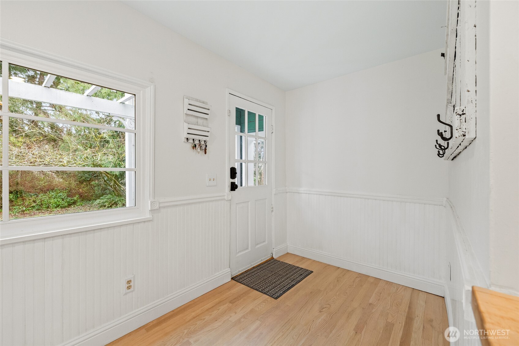 21260 Lake 16 Road Mount Vernon, WA 98274 - Photo 2 of 40 a view of a room with wooden floor and windows