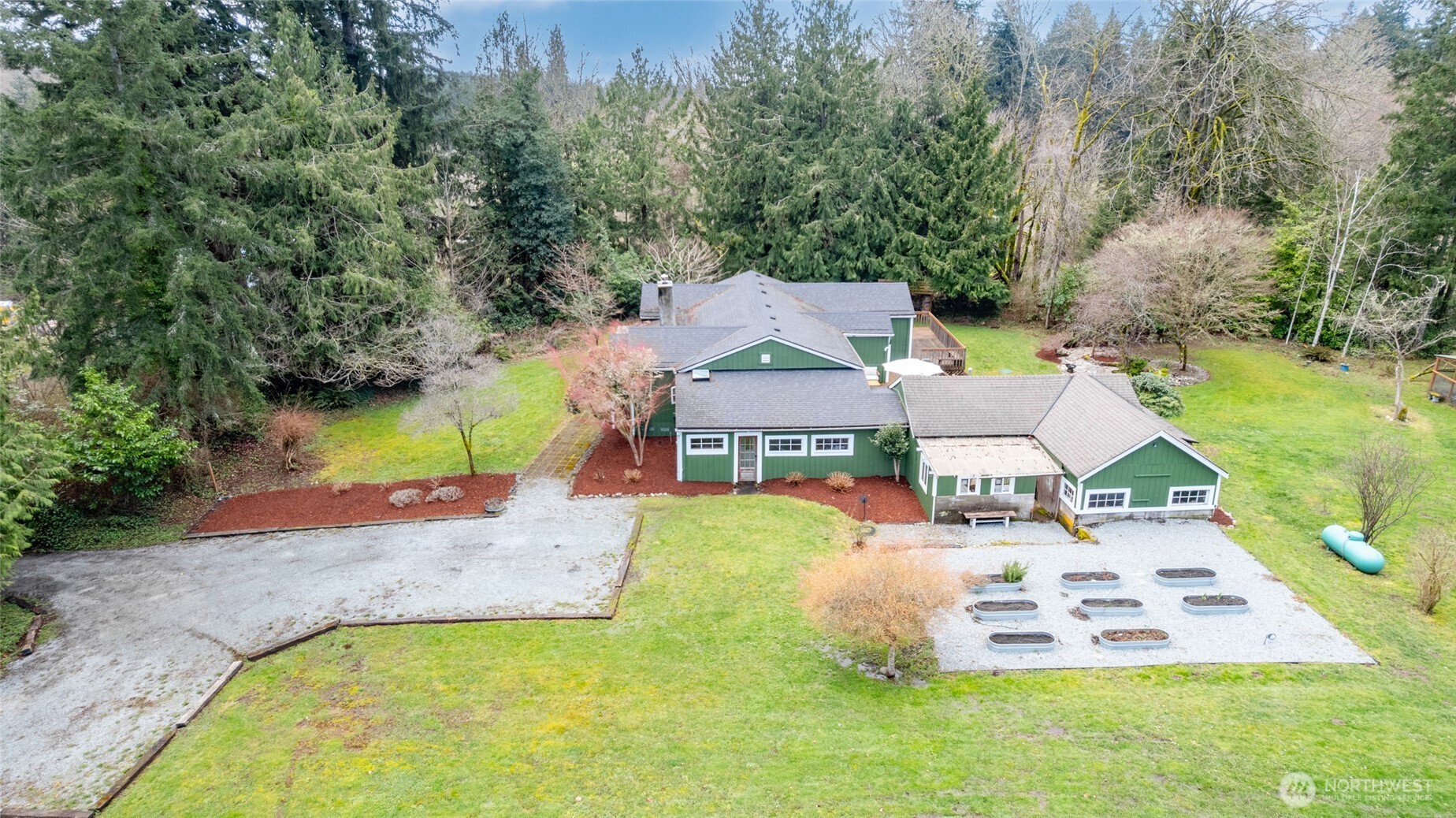 21260 Lake 16 Road Mount Vernon, WA 98274 - Photo 25 of 40 an aerial view of a house with swimming pool and big yard
