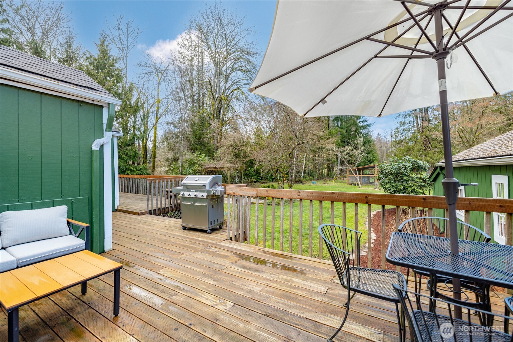 21260 Lake 16 Road Mount Vernon, WA 98274 - Photo 27 of 40 a view of a balcony with two chairs and a table