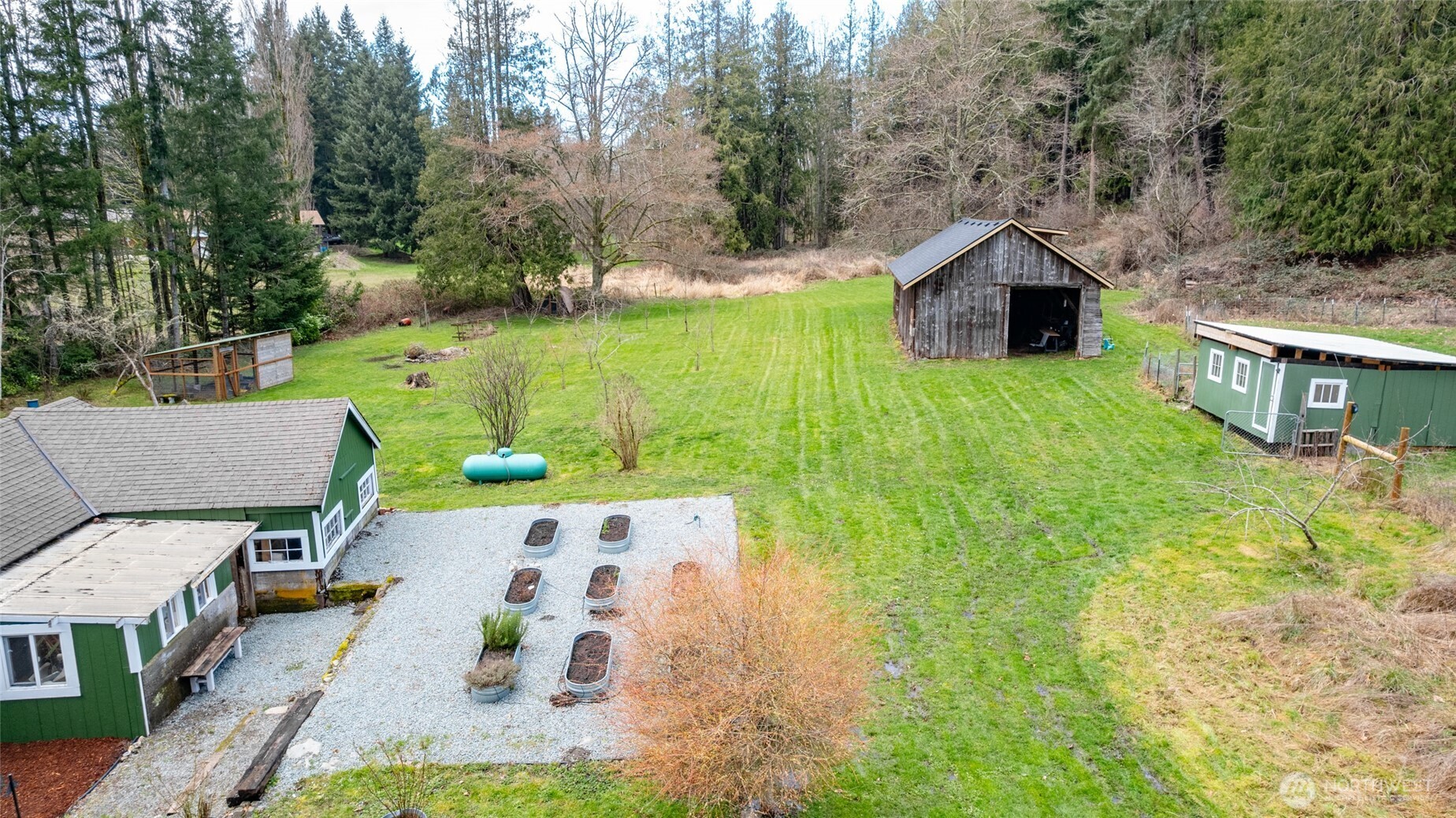 21260 Lake 16 Road Mount Vernon, WA 98274 - Photo 32 of 40 a view of a house with a yard