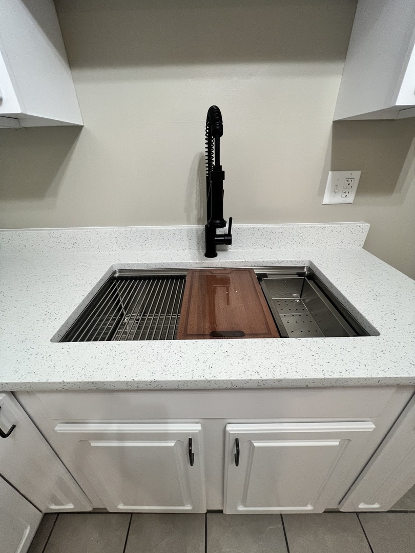 3330 Grove Avenue, Unit 1N Berwyn, IL 60402 - Photo 6 of 20 a close view of sink and stove