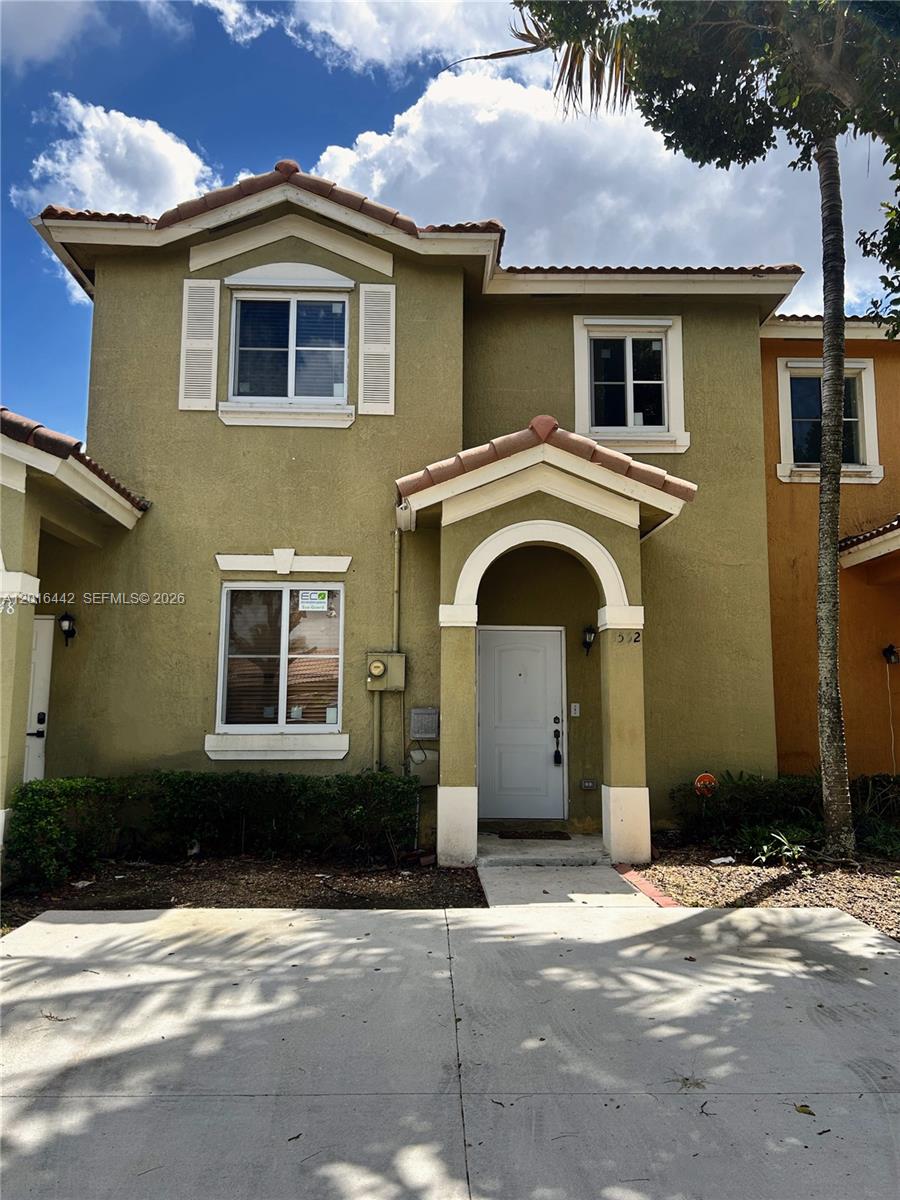 1552 Southwest 2nd Street Homestead, FL 33030 - Photo 2 of 4 a front view of a house