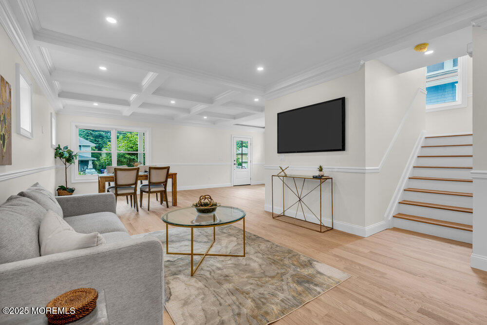 114 Harrison Avenue Red Bank, NJ 07701 - Photo 14 of 35 a living room with furniture and a flat screen tv