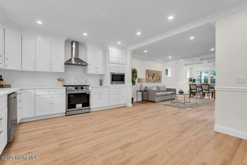 114 Harrison Avenue Red Bank, NJ 07701 - Photo 18 of 35 a view of kitchen with furniture and fireplace