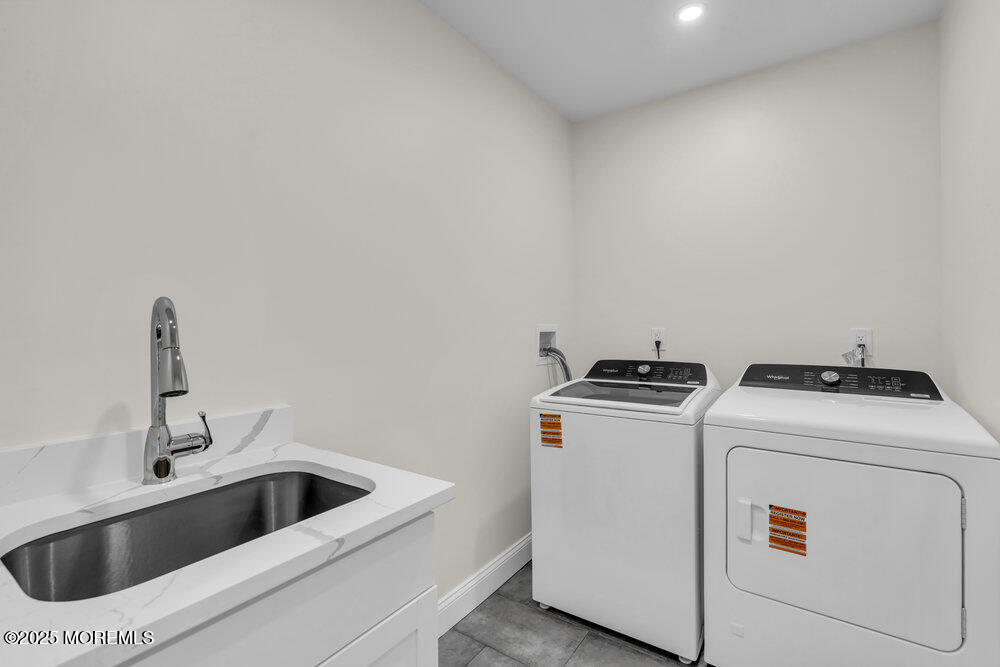 114 Harrison Avenue Red Bank, NJ 07701 - Photo 22 of 35 a view of storage and utility room with washer and dryer
