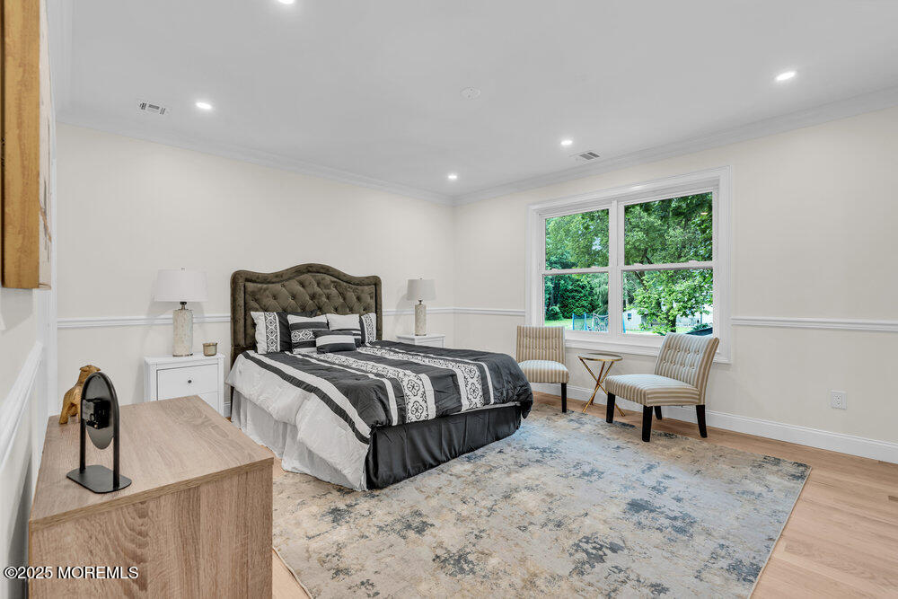 114 Harrison Avenue Red Bank, NJ 07701 - Photo 23 of 35 a bedroom with a bed and window