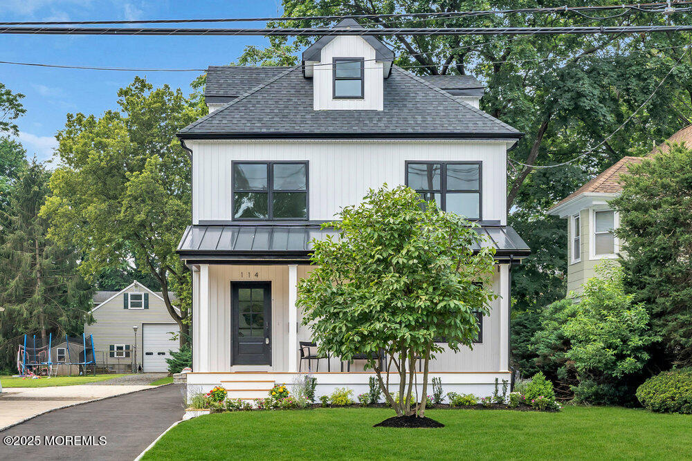 114 Harrison Avenue Red Bank, NJ 07701 - Photo 5 of 35 a front view of a house with a garden