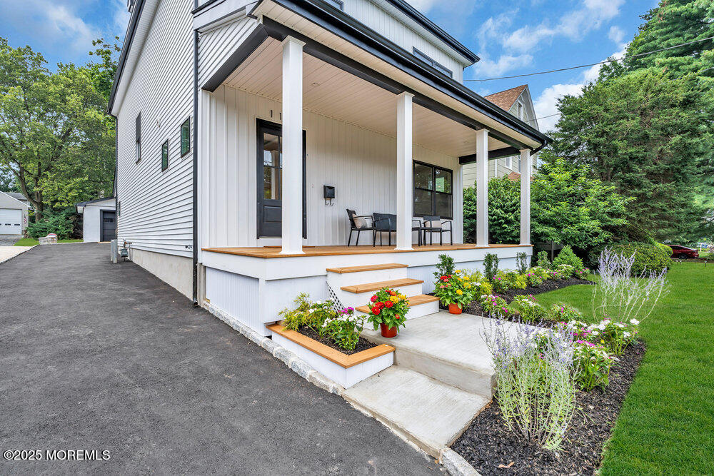 114 Harrison Avenue Red Bank, NJ 07701 - Photo 6 of 35 front view of a house with a small yard