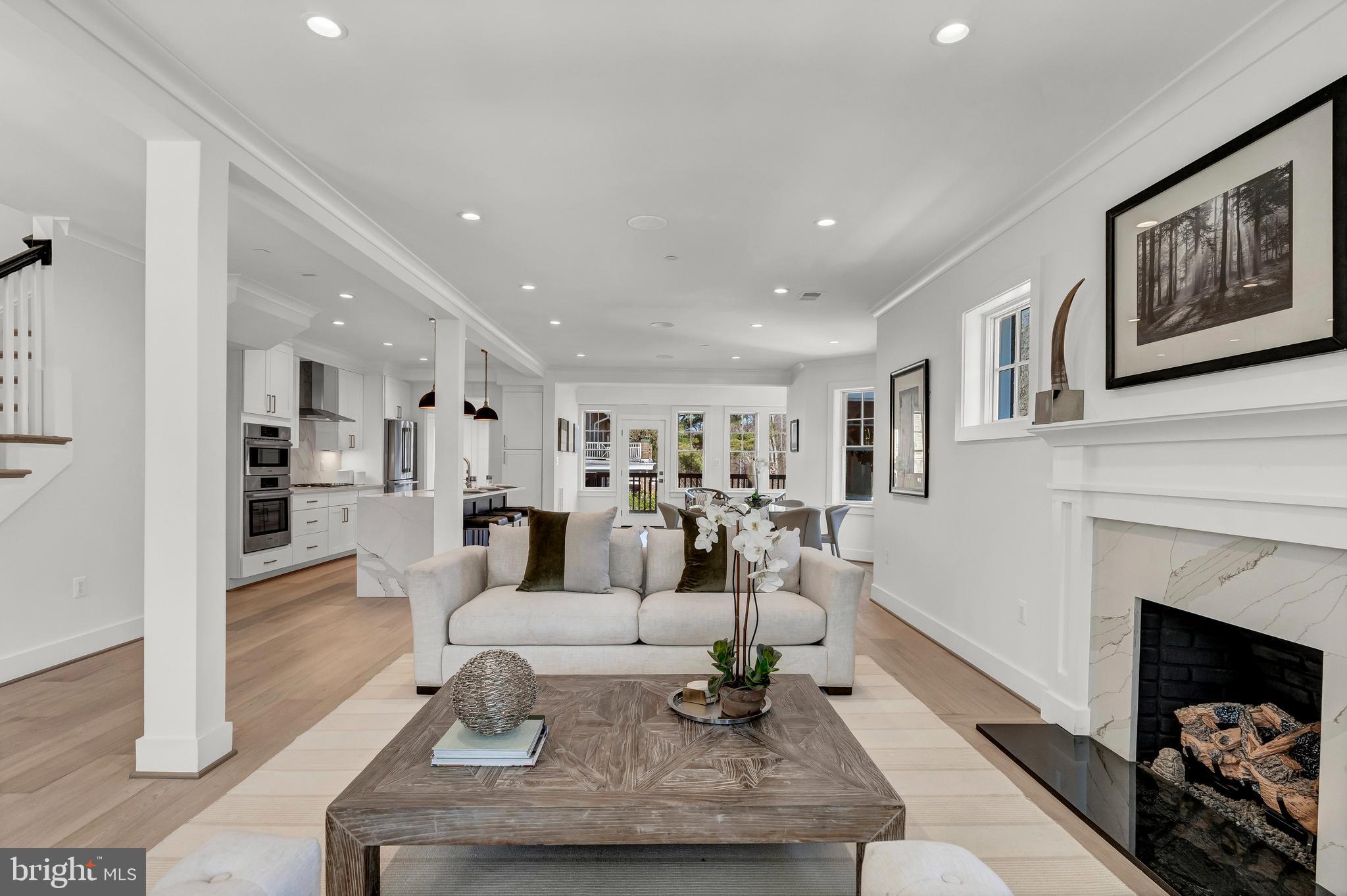2001 Klingle Road Northwest Washington, DC 20010 - Photo 12 of 50 a living room with furniture and a fireplace