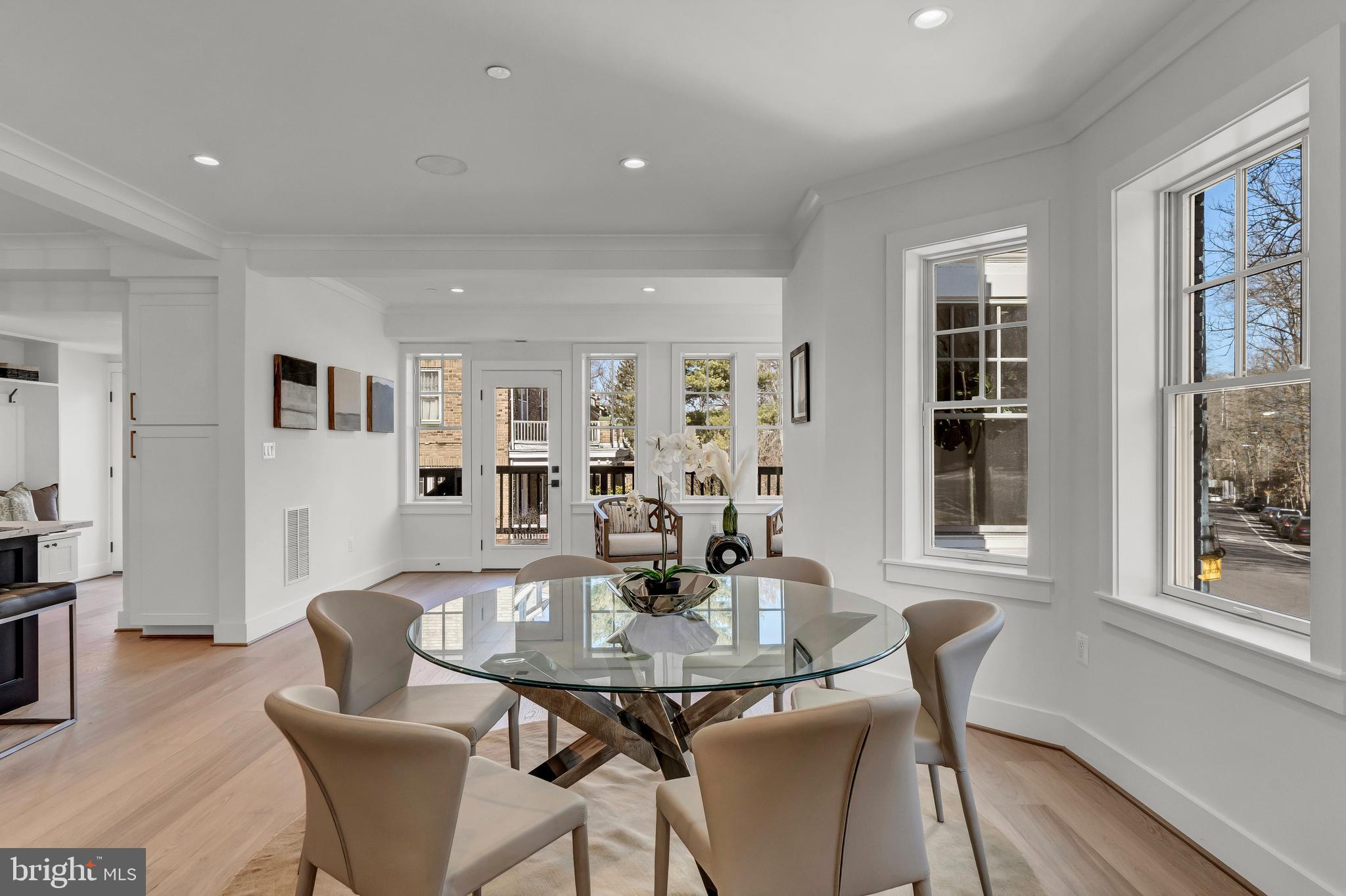 2001 Klingle Road Northwest Washington, DC 20010 - Photo 13 of 50 a view of a dining room with furniture and wooden floor