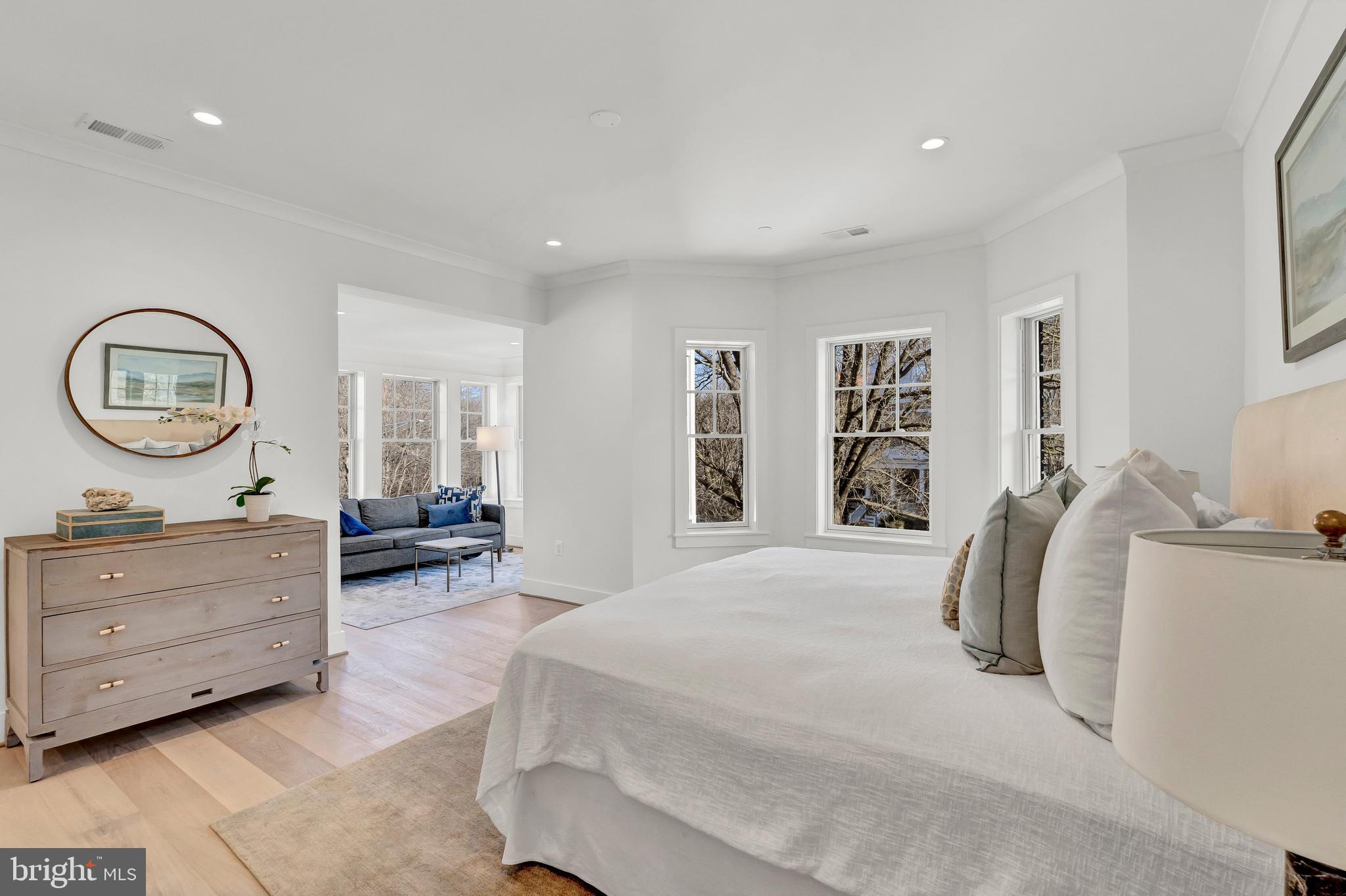 2001 Klingle Road Northwest Washington, DC 20010 - Photo 28 of 50 a bedroom with a bed and a dresser