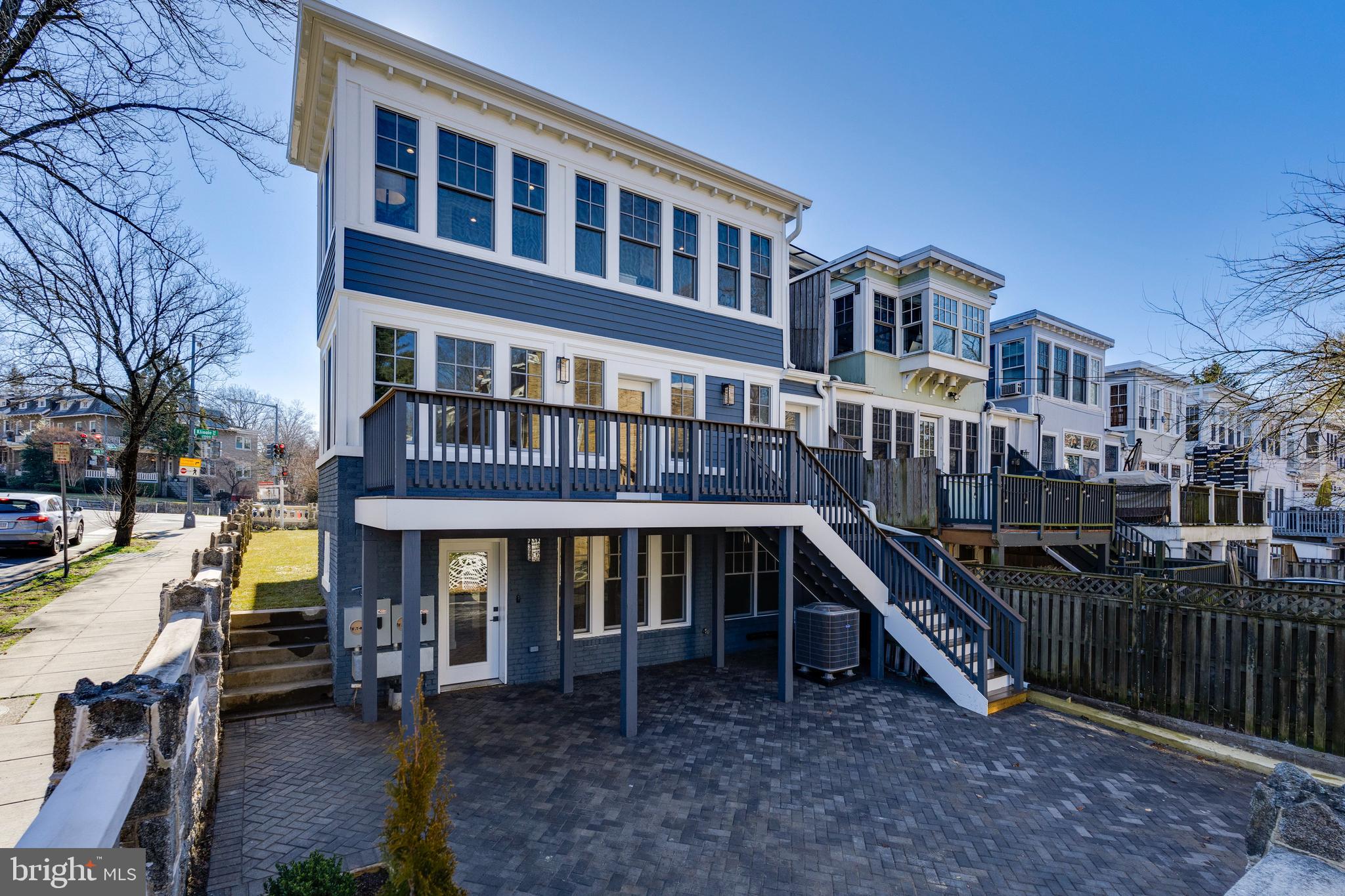 2001 Klingle Road Northwest Washington, DC 20010 - Photo 4 of 50 a front view of a building with retail shops