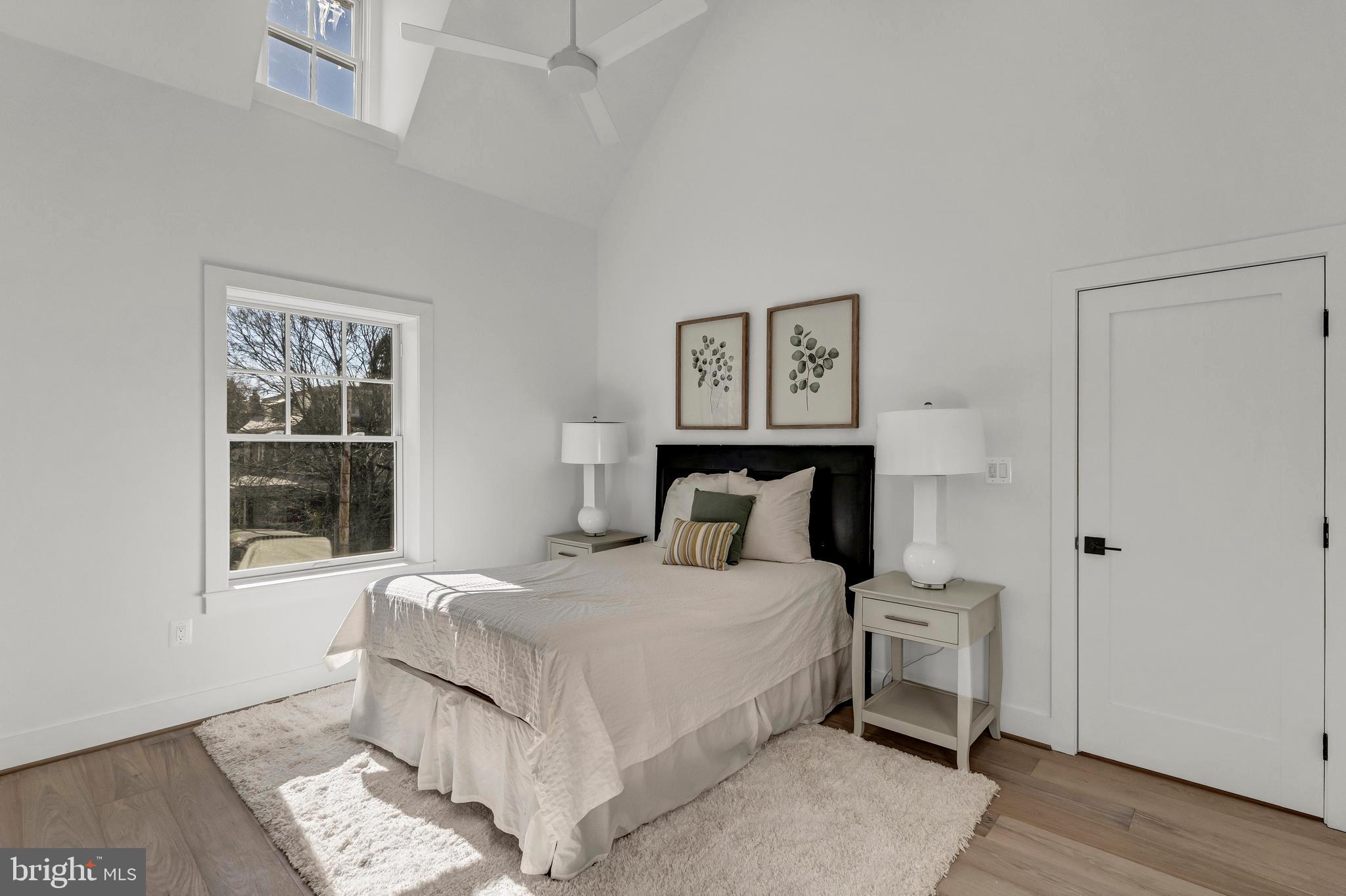 2001 Klingle Road Northwest Washington, DC 20010 - Photo 41 of 50 a bedroom with a bed and a window