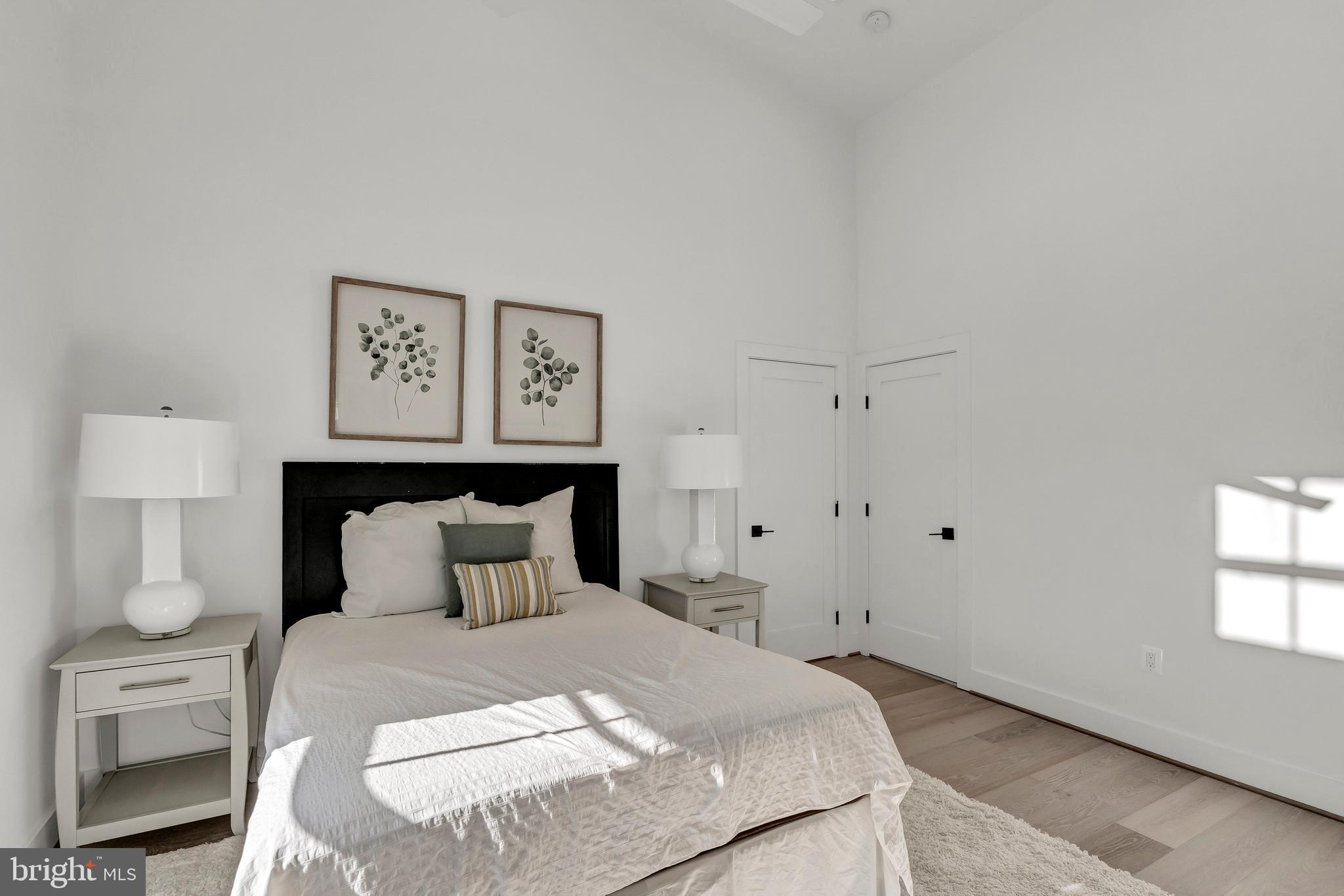 2001 Klingle Road Northwest Washington, DC 20010 - Photo 42 of 50 a bedroom with a bed and window