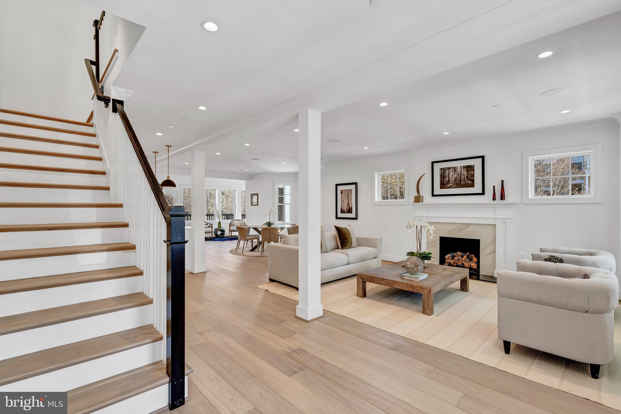 2001 Klingle Road Northwest Washington, DC 20010 - Photo 7 of 50 a living room with furniture and a fireplace