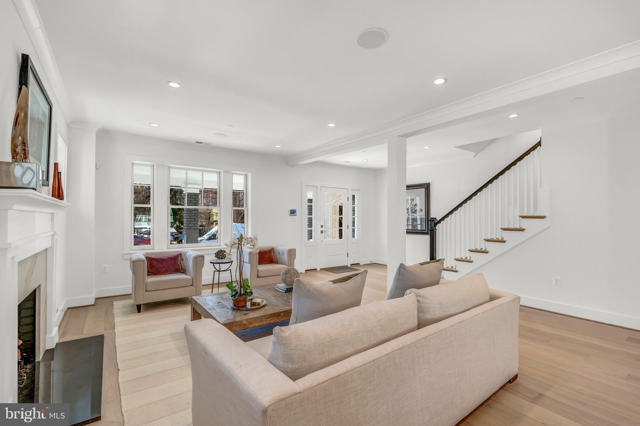 2001 Klingle Road Northwest Washington, DC 20010 - Photo 8 of 50 a living room with furniture and a fireplace