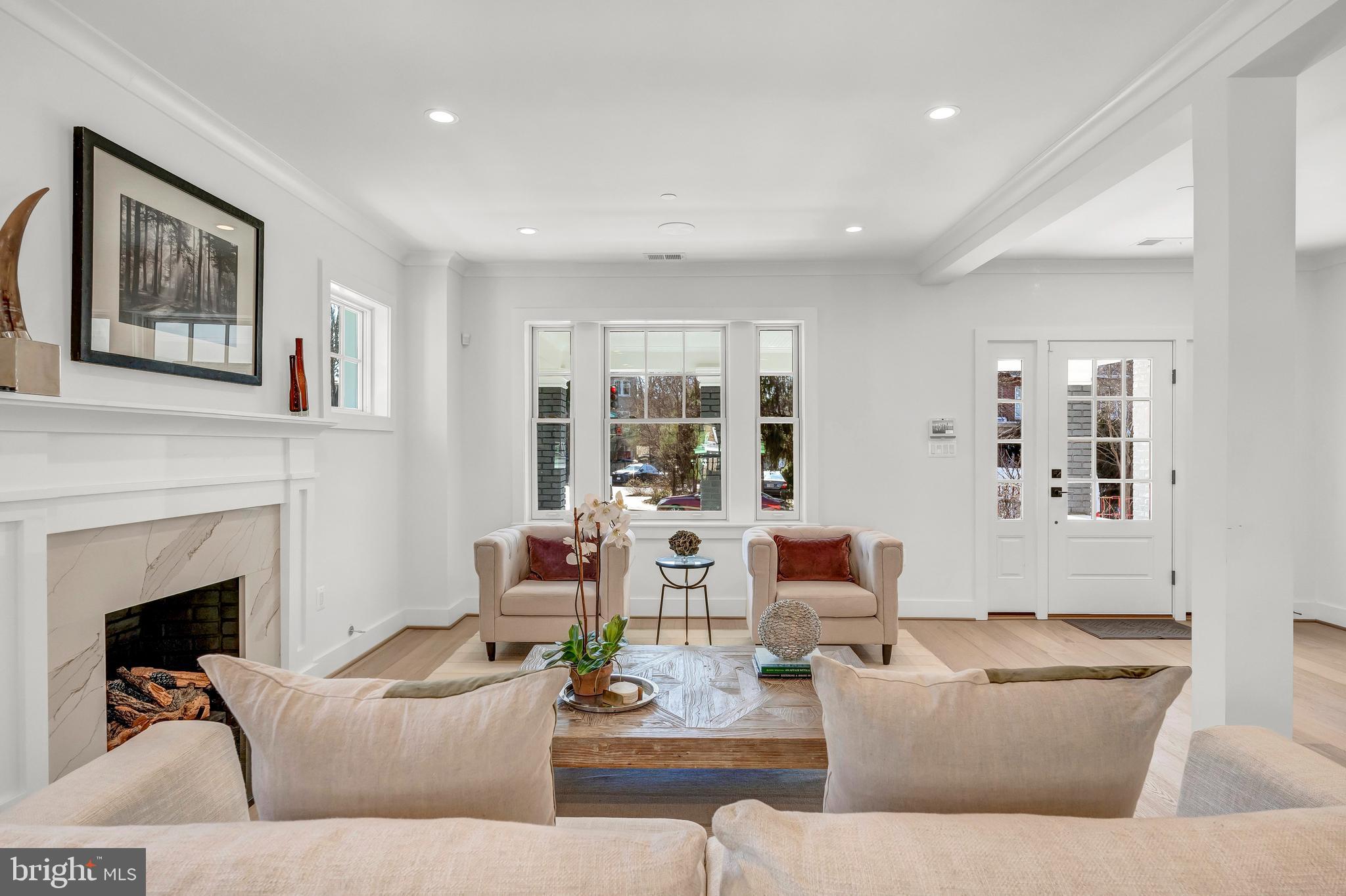 2001 Klingle Road Northwest Washington, DC 20010 - Photo 10 of 50 a living room with furniture and a fireplace