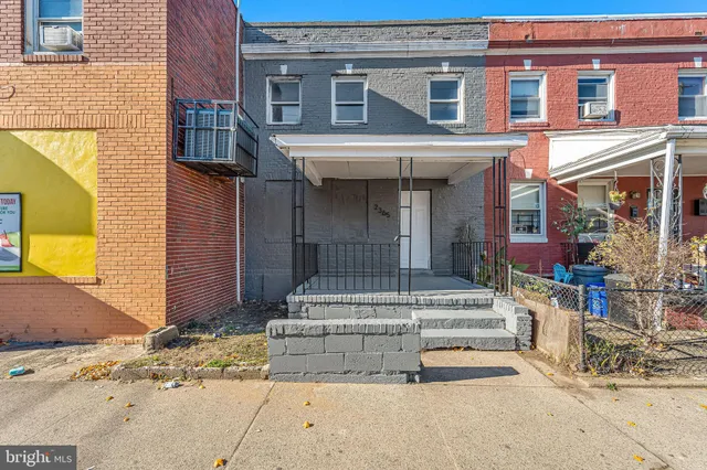a view of a brick building with windows