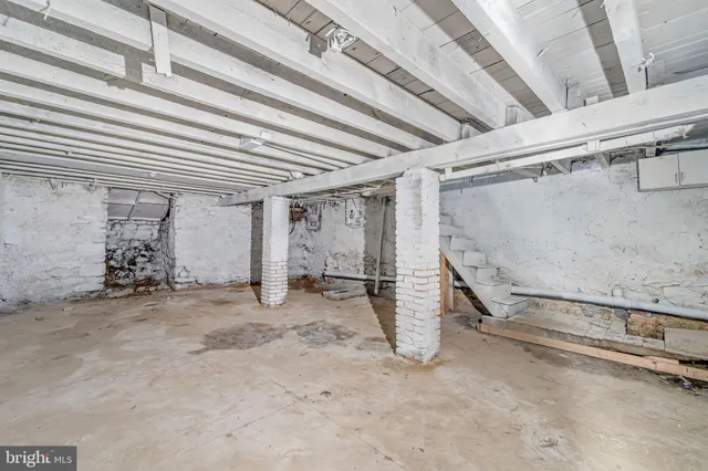 a view of a room with wooden walls