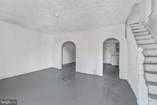 an empty room with windows