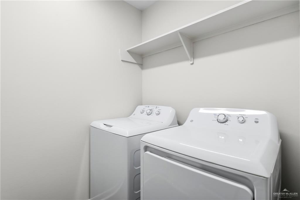 14221 Chalk Rdg Drive McAllen, TX 78504 - Photo 16 of 17 a utility room with dryer and washer