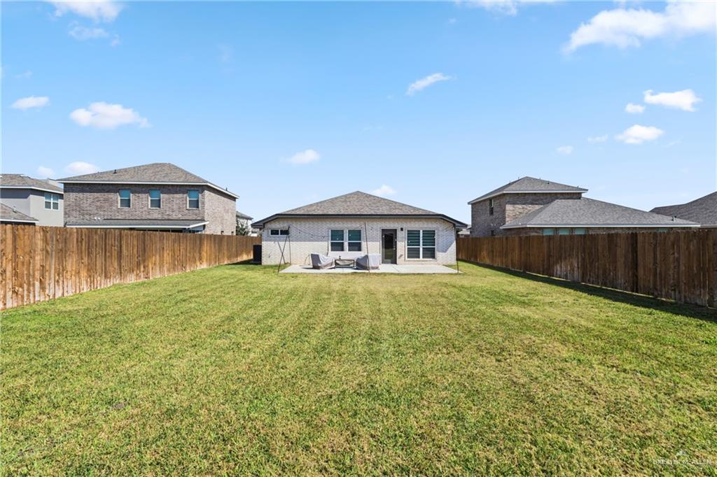 14221 Chalk Rdg Drive McAllen, TX 78504 - Photo 17 of 17 a front view of a house with garden