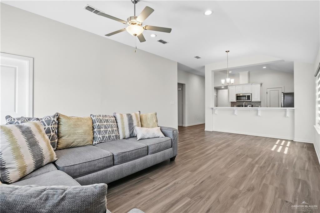 14221 Chalk Rdg Drive McAllen, TX 78504 - Photo 2 of 17 a living room with furniture and kitchen view