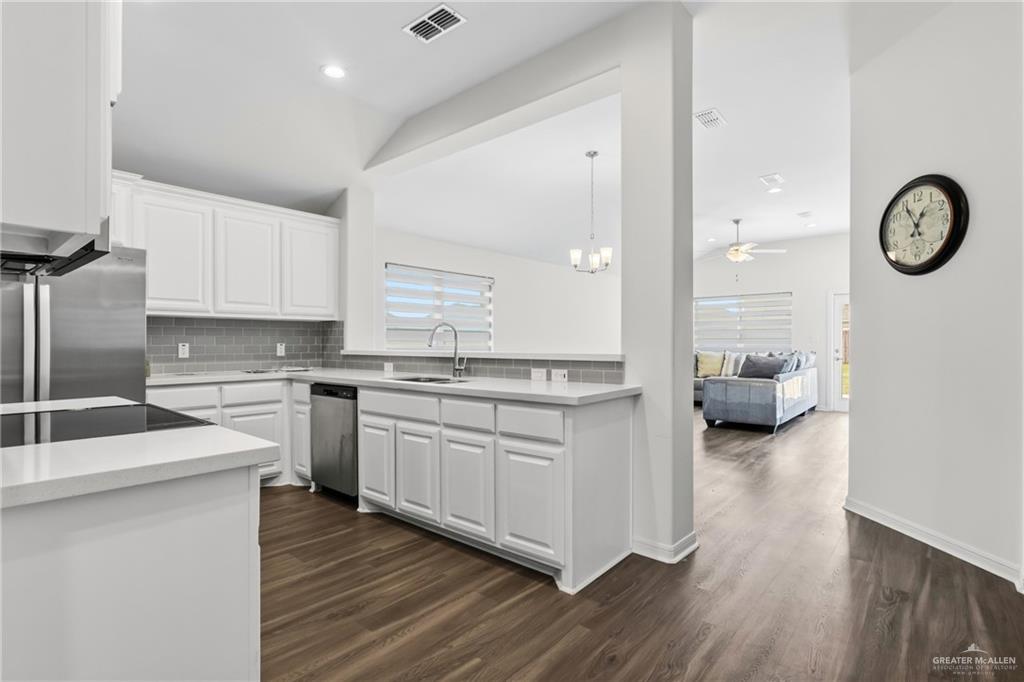 14221 Chalk Rdg Drive McAllen, TX 78504 - Photo 4 of 17 a kitchen with sink and cabinets