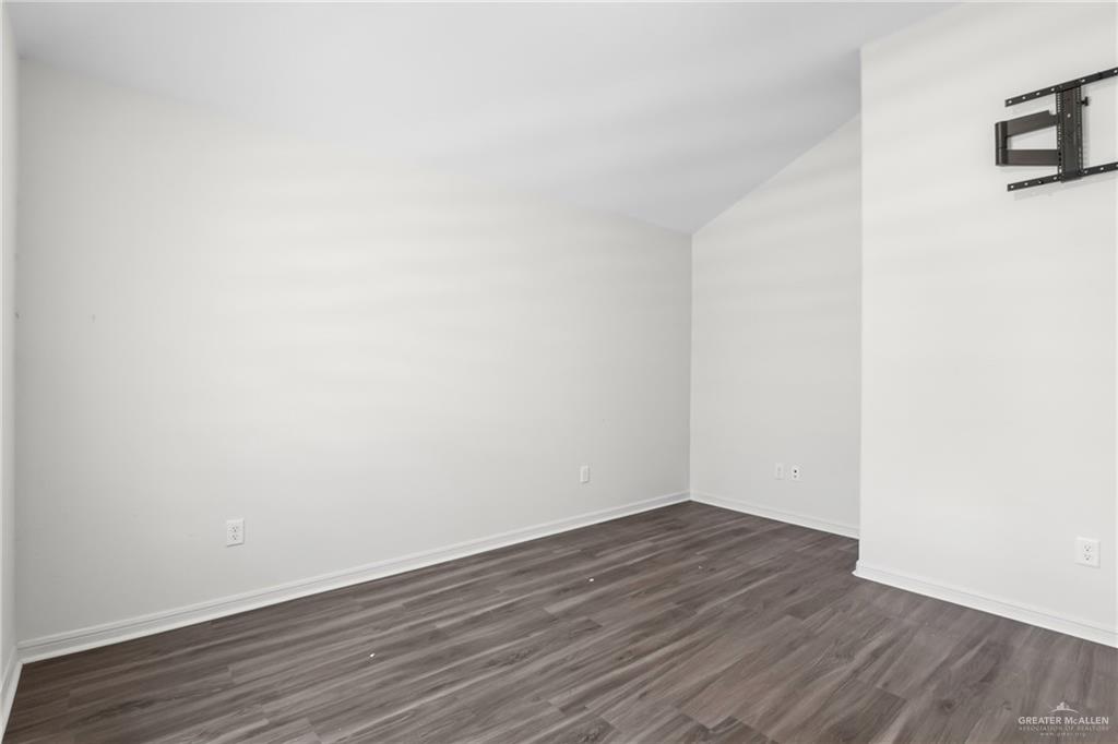 14221 Chalk Rdg Drive McAllen, TX 78504 - Photo 9 of 17 a view of an empty room with wooden floor